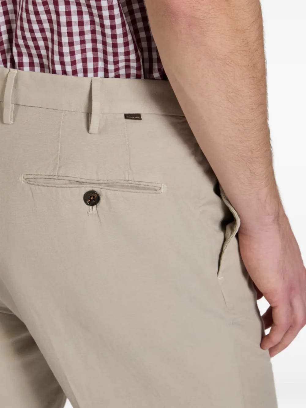 Chinolino pleated trousers