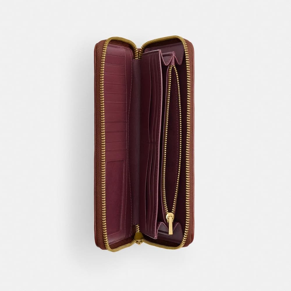Coach Essential Continental Wallet In Signature Canvas Brass Tan Caramel