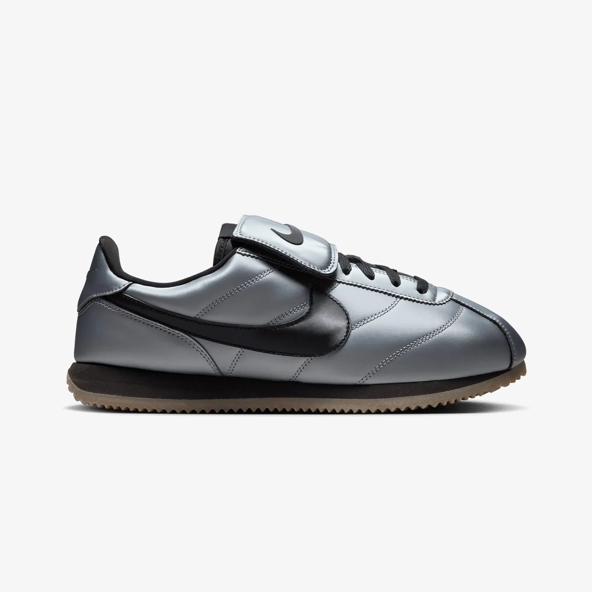 NIKE CORTEZ { MTLC COOL GREY/BLACK-GUM DARK BROWN