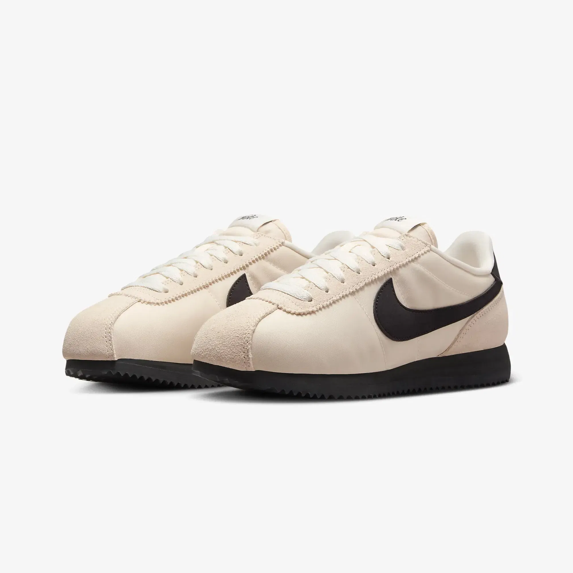 NIKE CORTEZ TEXTILE { GUAVA ICE/BLACK-SAIL-PHANTOM