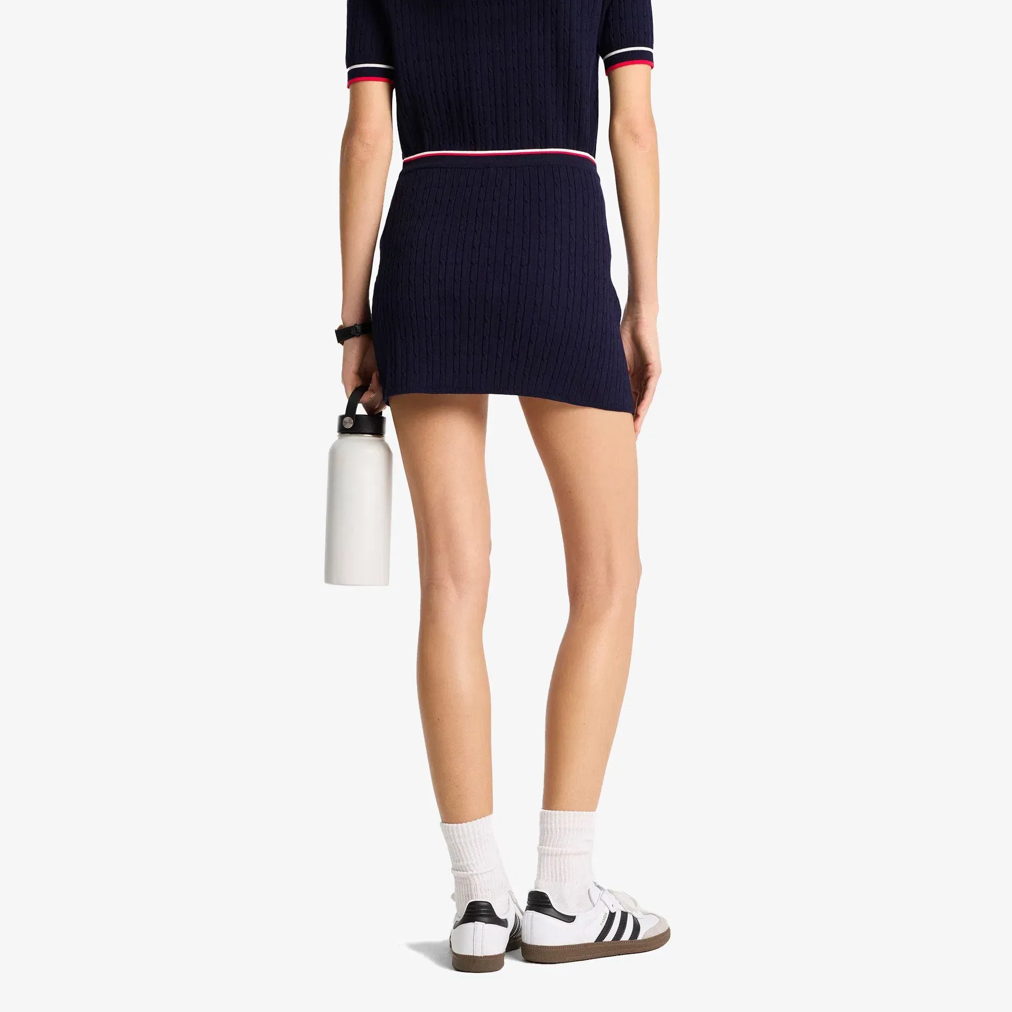 SPORTY & RICH SERIF LOGO MINI CABLE SKIRT { NAVY