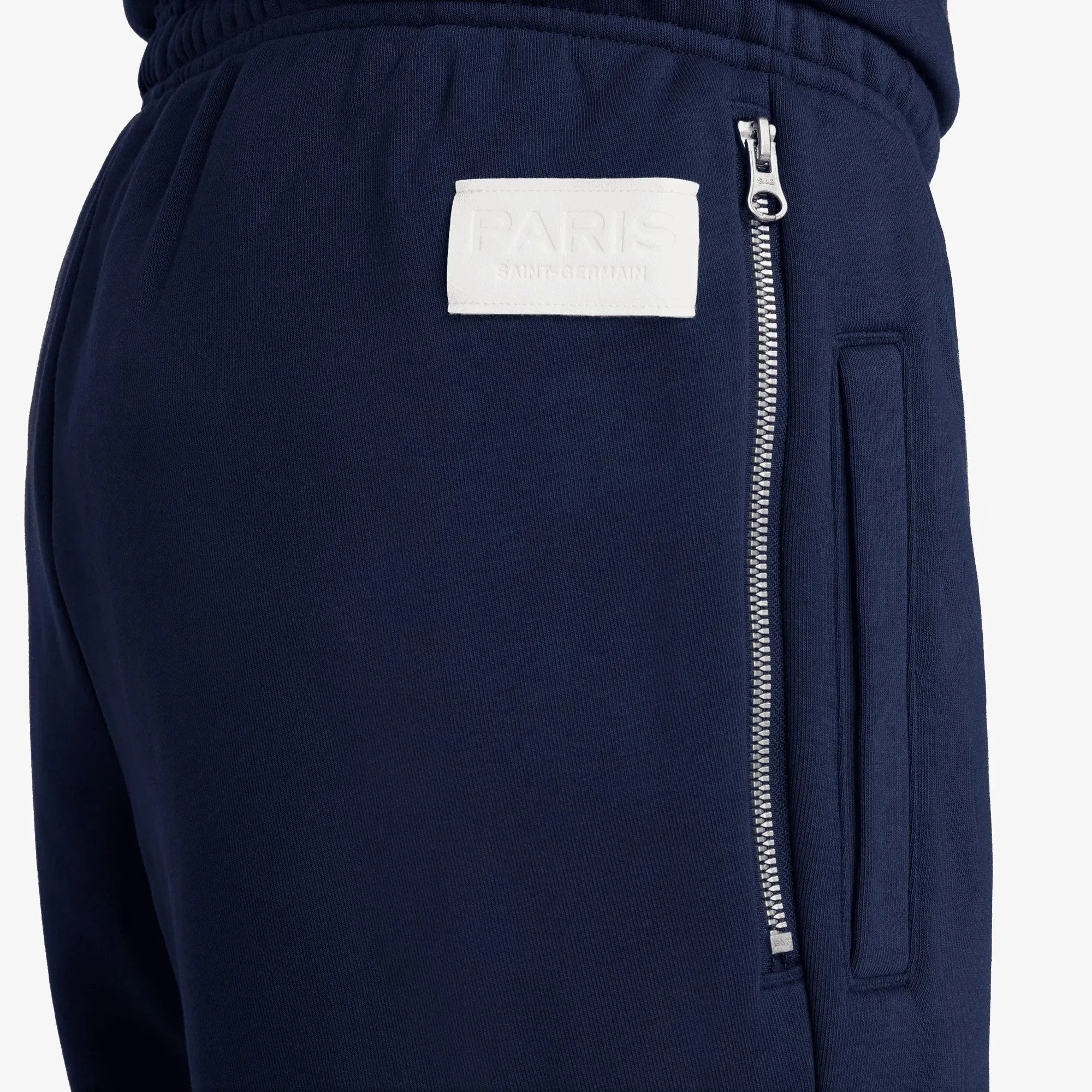 NIKE PARIS SAINT-GERMAIN STANDARD ISSUE DRI-FIT SOCCER TAPERED PANT { MIDNIGHT NAVY/UNIVERSITY RED