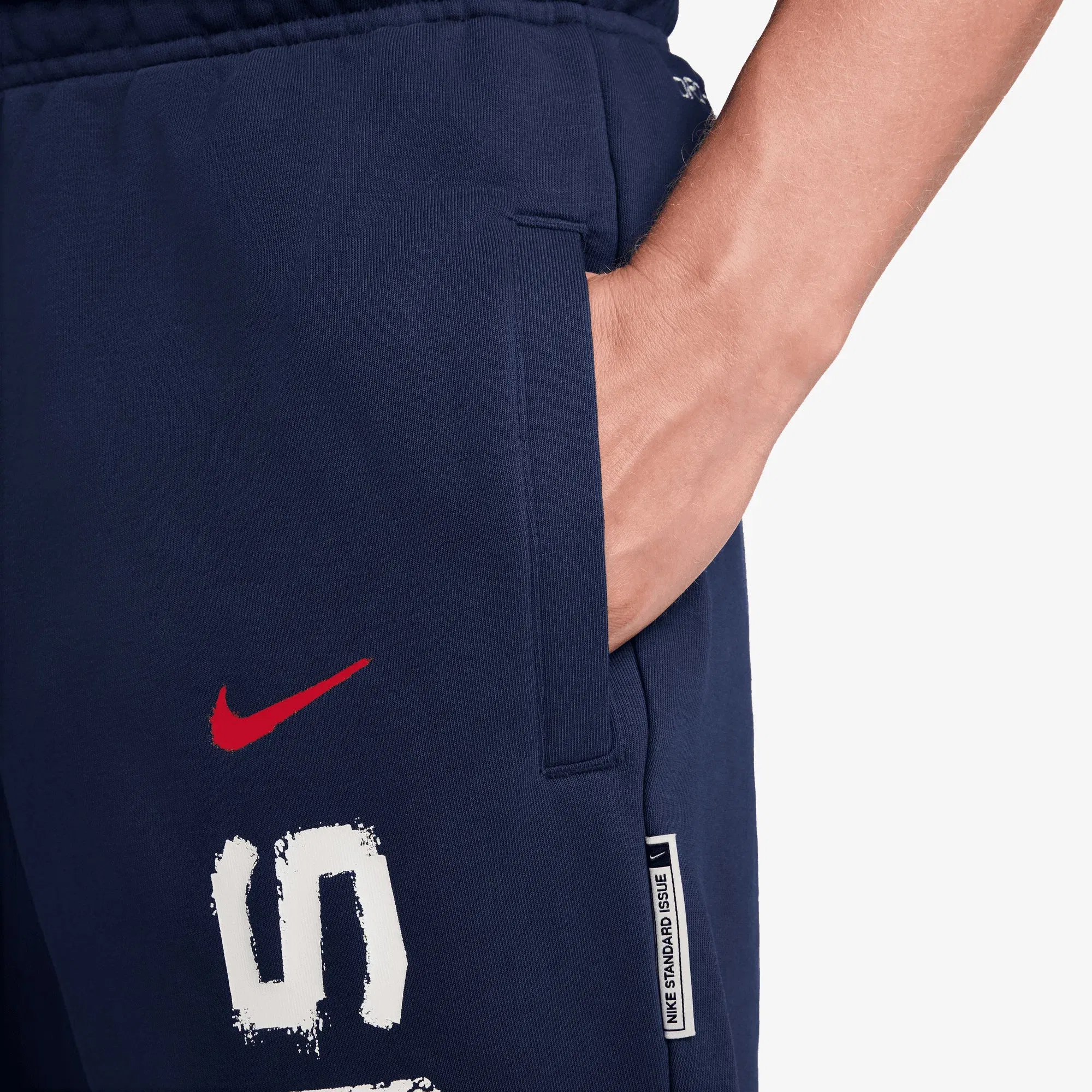 NIKE PARIS SAINT-GERMAIN STANDARD ISSUE DRI-FIT SOCCER TAPERED PANT { MIDNIGHT NAVY/UNIVERSITY RED