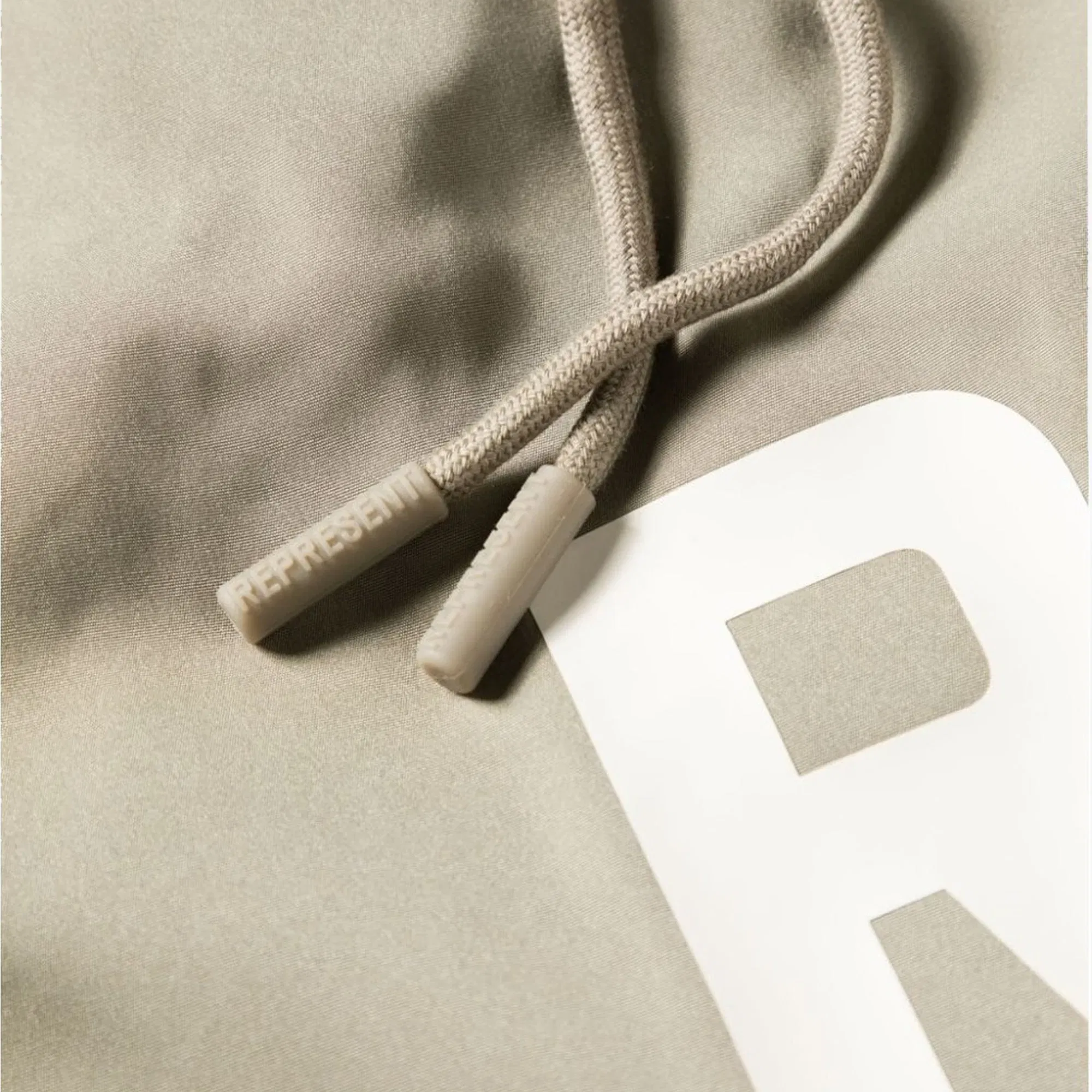 Represent SWIM SHORTS { KHAKI