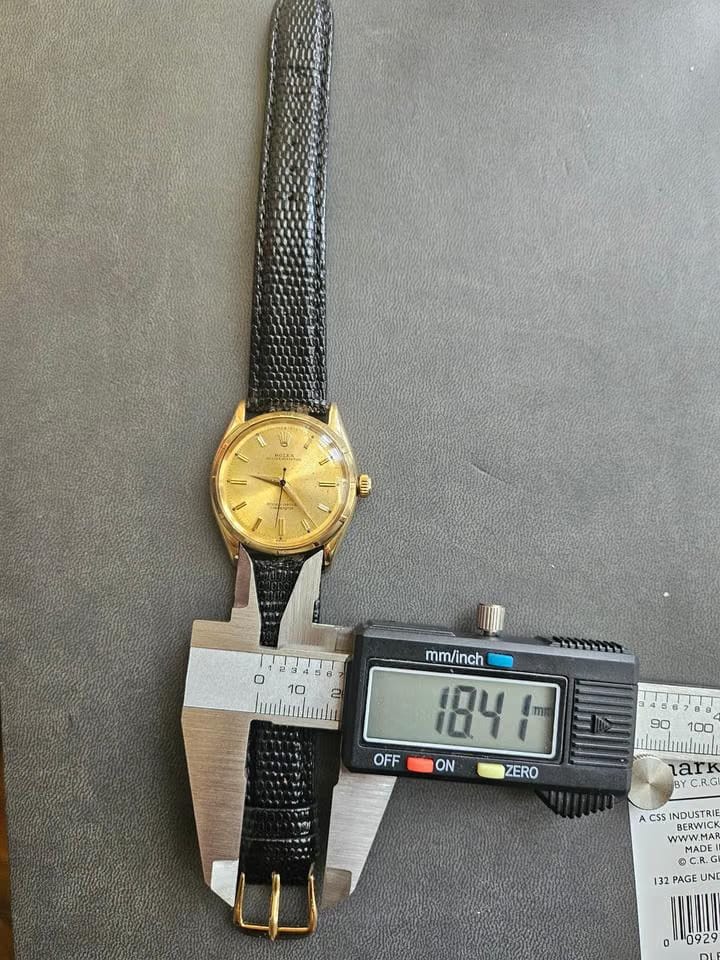 Rolex | Oyster Perpetual | 6565 | Yellow gold | 34 mm | Leather | Champagne | Automatic