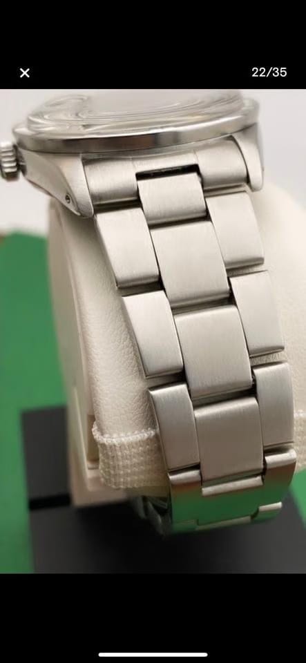 Rolex | Oyster Perpetual | 15210 | Steel | 34 mm | Steel | Champagne | Automatic