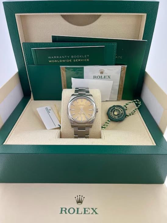 Rolex | Oyster Perpetual | 114200 | Steel | 34 mm | Steel | Champagne | Automatic