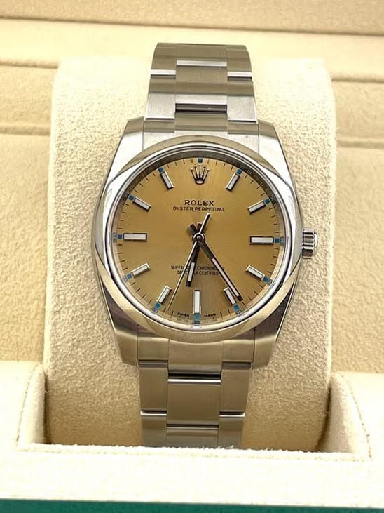 Rolex | Oyster Perpetual | 114200 | Steel | 34 mm | Steel | Champagne | Automatic