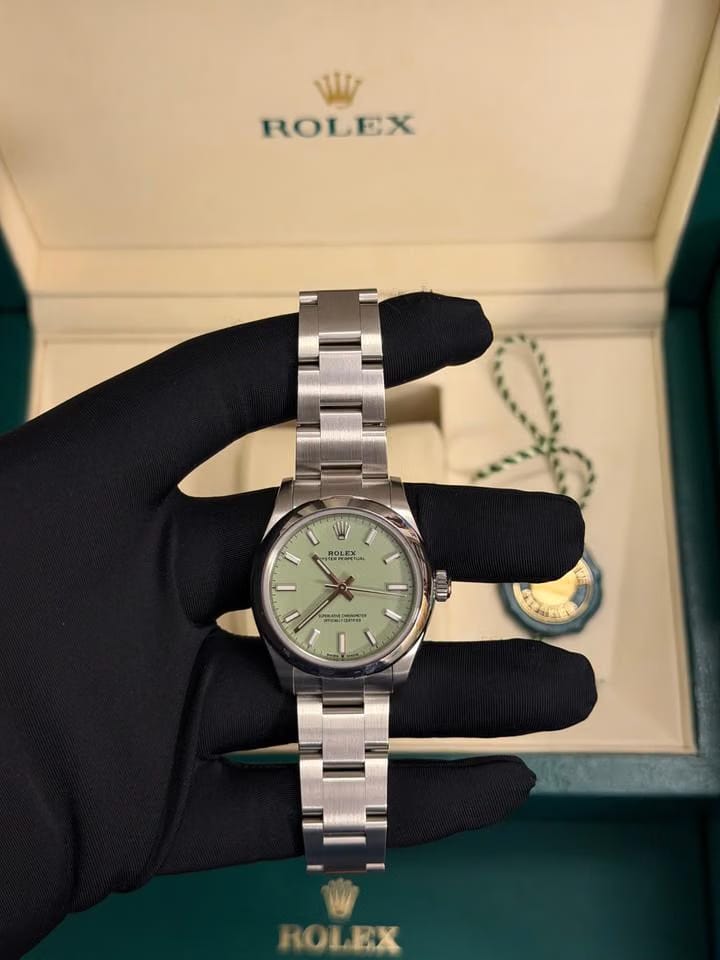 Rolex | Oyster Perpetual | 67480 | Steel | 31 mm | Steel | Green | Automatic