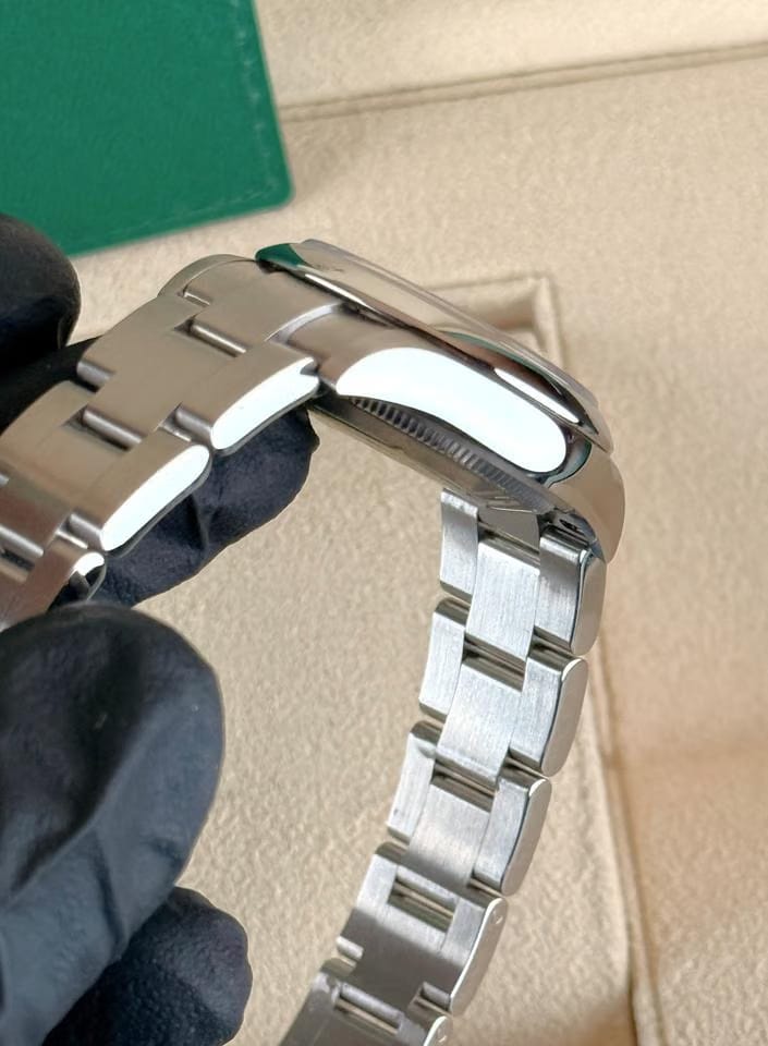 Rolex | Oyster Perpetual | 277200 | Steel | 31 mm | Steel | Red | Automatic