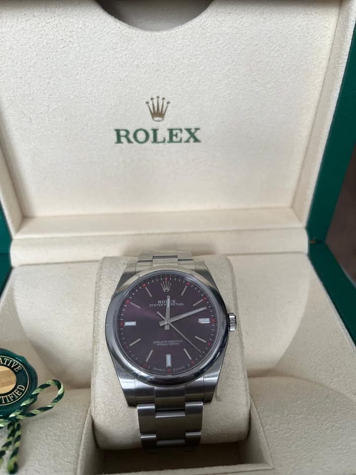Rolex Oyster Perpetual Fully factory stickered with original box and paper work.