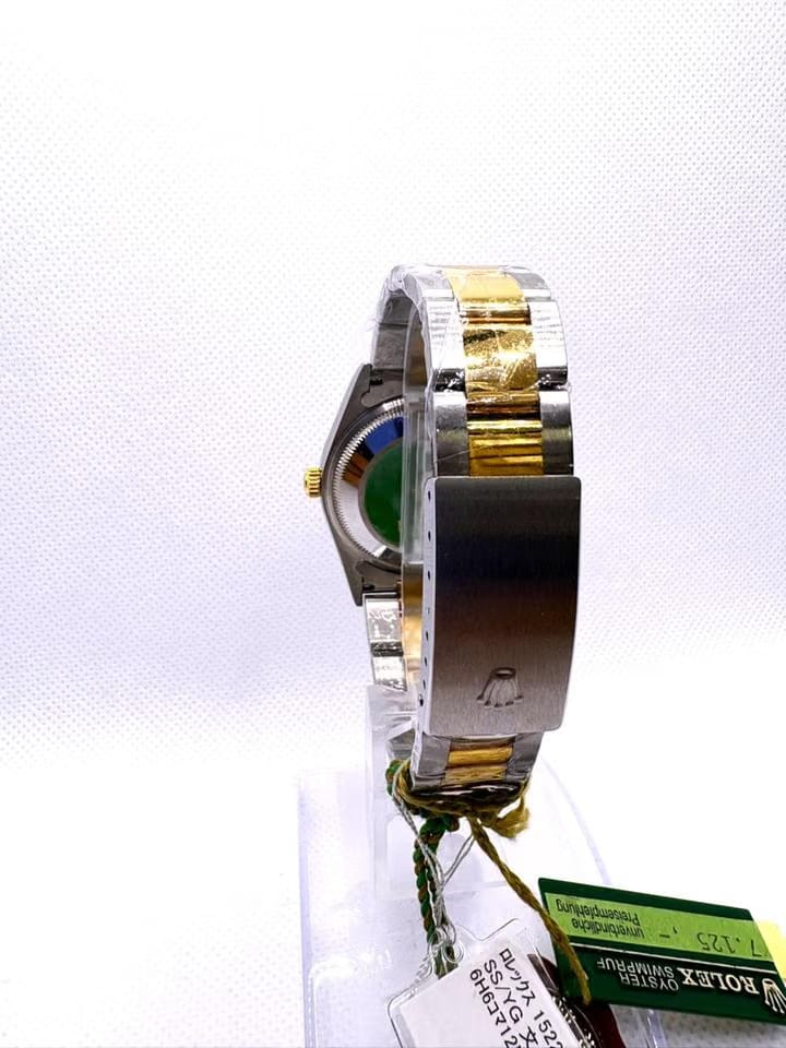 Rolex | Oyster Perpetual | 15223 | Gold/Steel | 34 mm | Gold/Steel | Black | Automatic