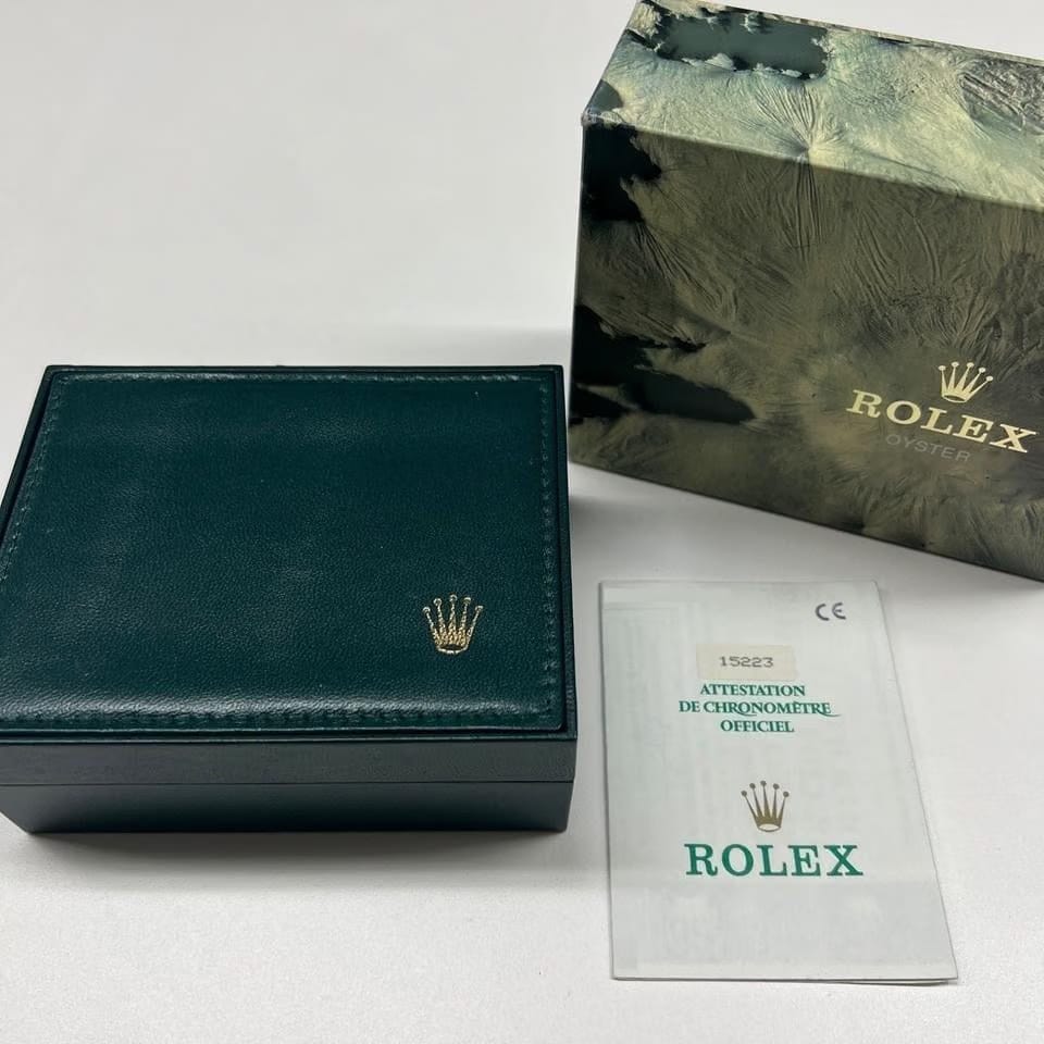 Rolex | Oyster Perpetual | 15223 | Gold/Steel | 34 mm | Gold/Steel | Black | Automatic