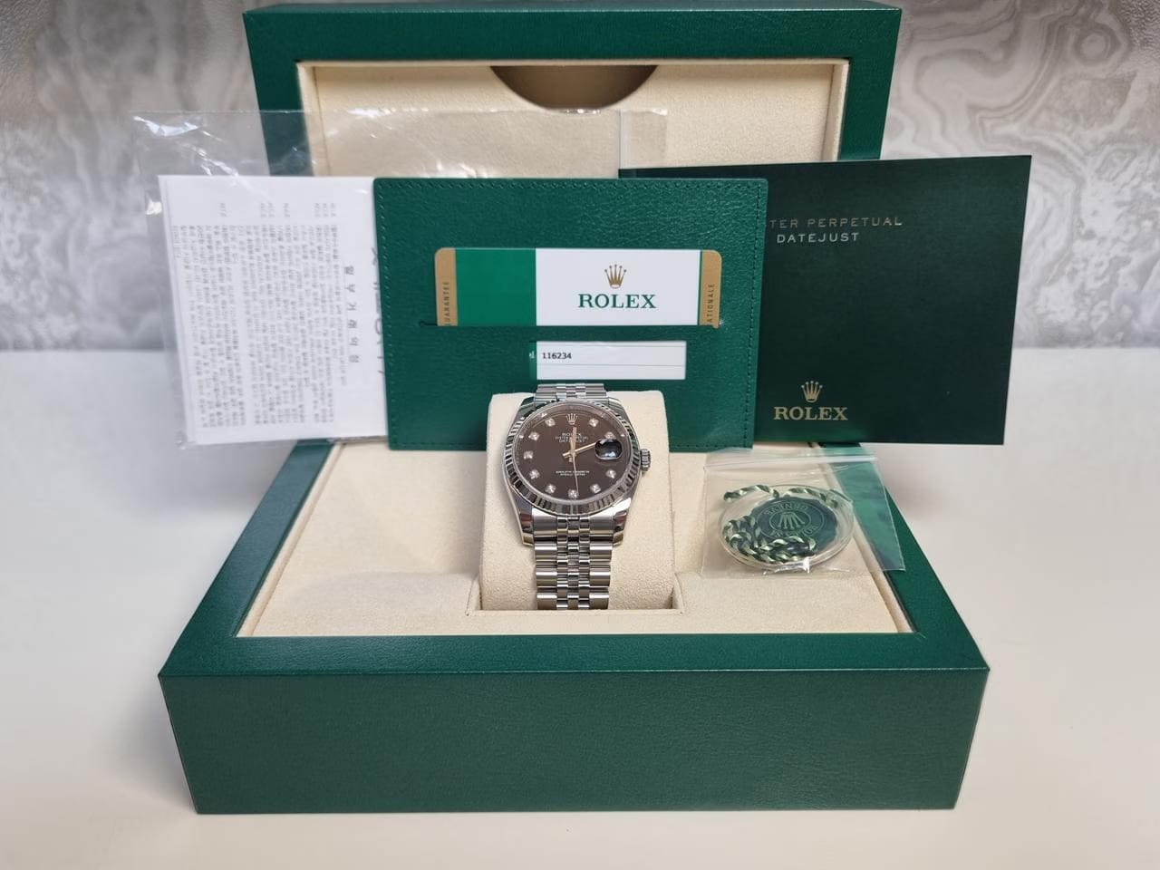 Rolex | Datejust | 116234 | White gold and steel | 36 mm | Steel | Black | Automatic