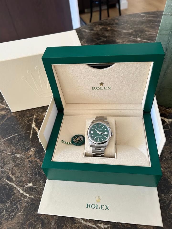 Rolex | Oyster Perpetual | 1100 | Steel | 41 mm | Steel | Green | Automatic