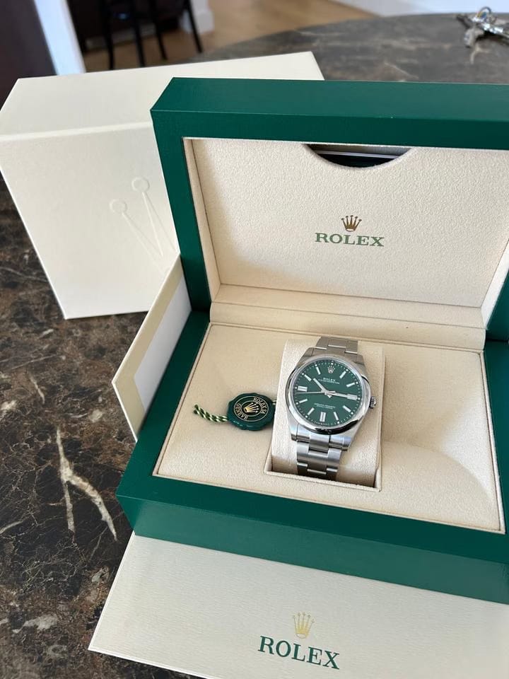 Rolex | Oyster Perpetual | 1100 | Steel | 41 mm | Steel | Green | Automatic
