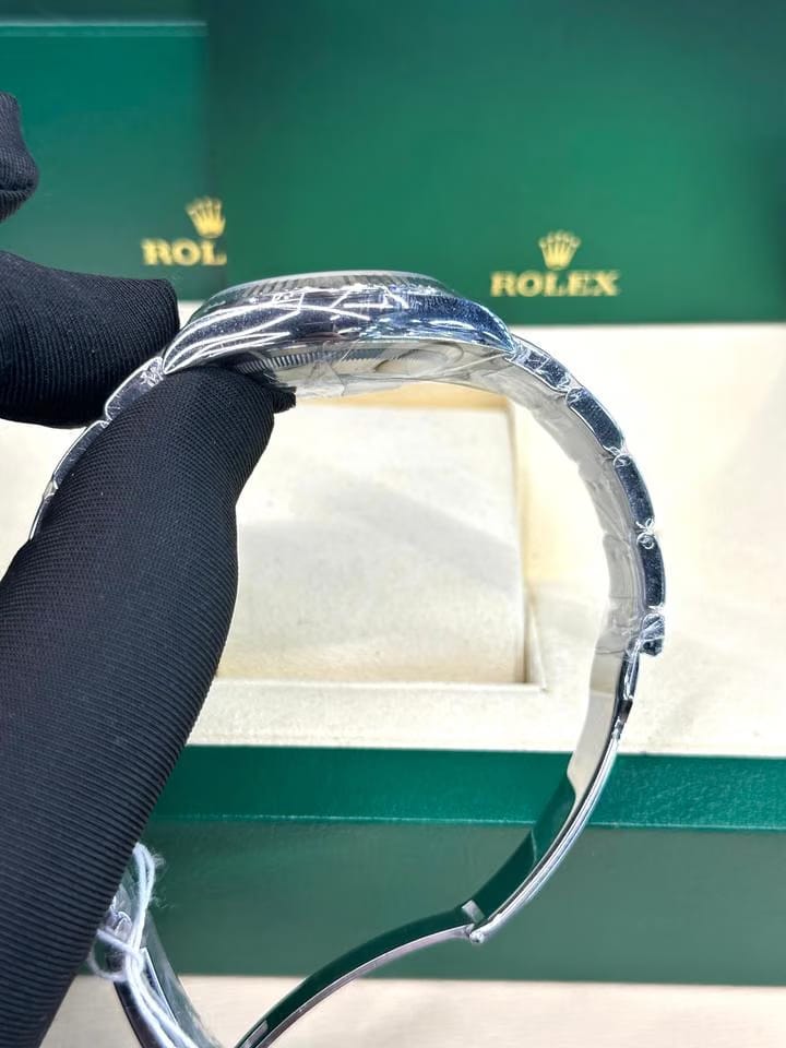 Rolex | Datejust | 126234 | White gold and steel | 36 mm | Steel | Black | Automatic