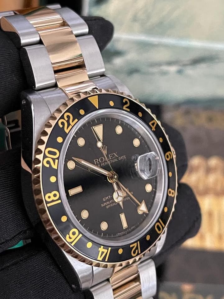 Rolex | GMT-Master II | 16713 | Gold/Steel | 40 mm | Gold/Steel | Black | Automatic