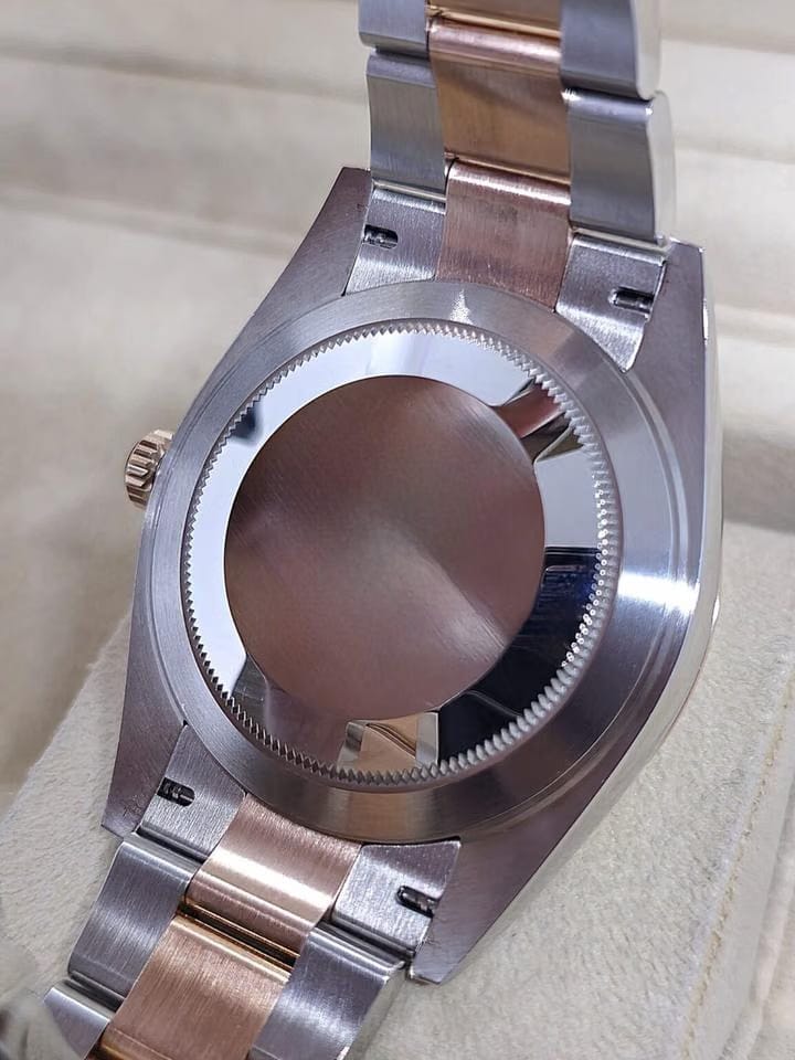 Rolex | Datejust | 126331 | Gold/Steel | 41 mm | Gold/Steel | Green | Automatic