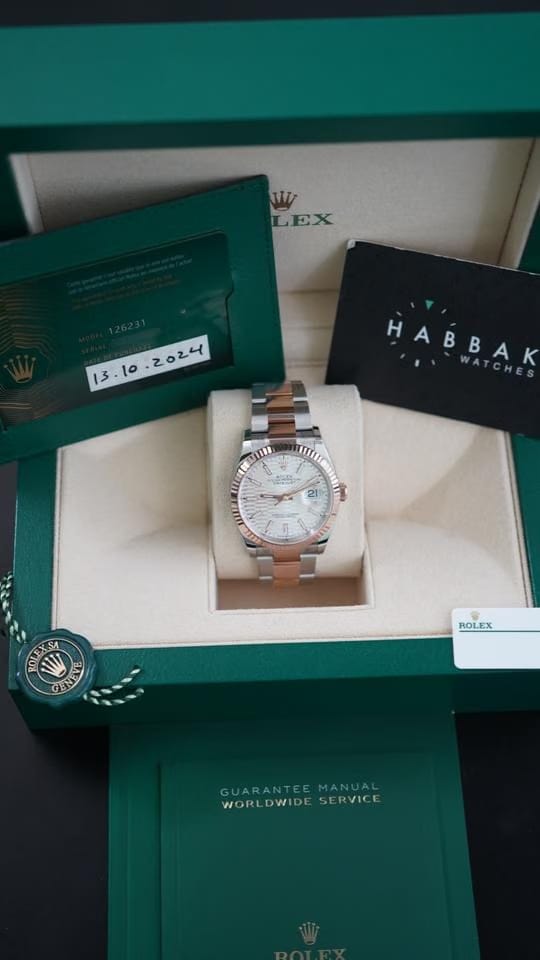 Rolex | Datejust | 126231 | Rose gold | 36 x 44 mm | Gold/Steel | Silver | Automatic