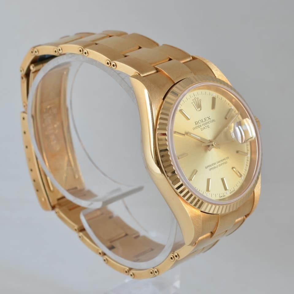 Rolex | Oyster Perpetual | 15238 | Yellow gold | 34 mm | Yellow gold | Champagne | Automatic
