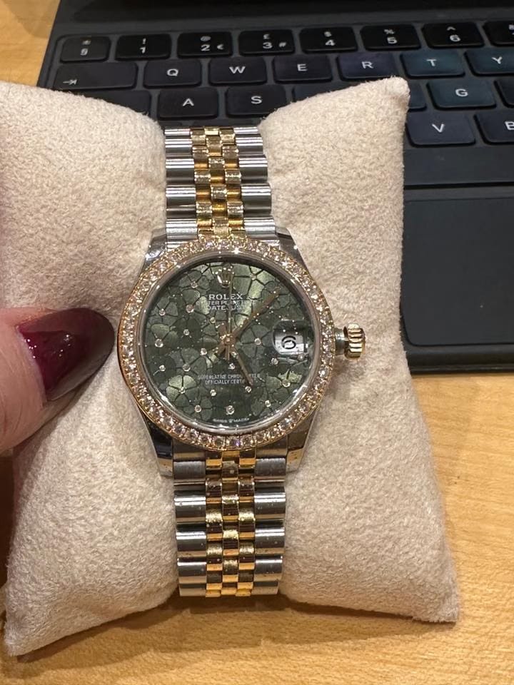 Rolex Datejust Perpetual datejust Beautiful Diamond bezel and green petals with diamond face