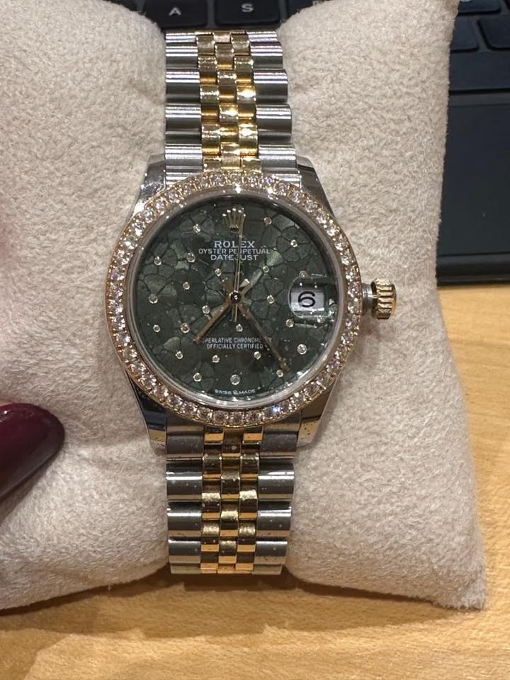 Rolex Datejust Perpetual datejust Beautiful Diamond bezel and green petals with diamond face