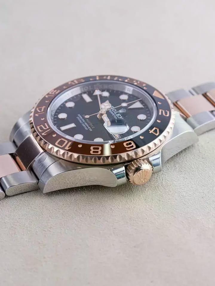 Rolex | GMT-Master II | 126711CHNR | Gold/Steel | 40 x 4 mm | Gold/Steel | Black | Automatic