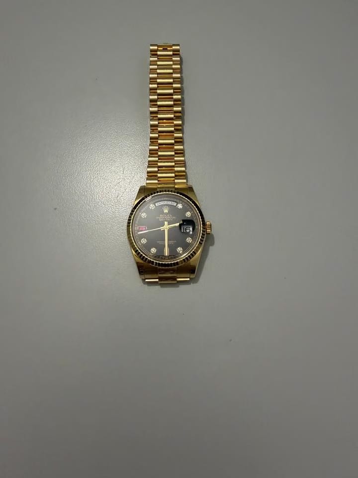 Rolex | Day-Date | 118238 | Yellow gold | 36 x 43 mm | Yellow gold | Black | Automatic