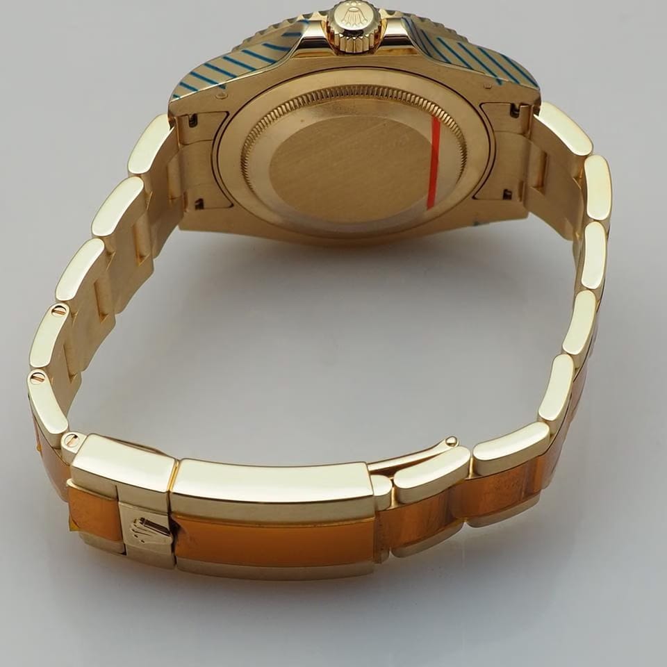 Rolex | GMT-Master II | 116718LN | Yellow gold | 40 mm | Yellow gold | Green | Automatic