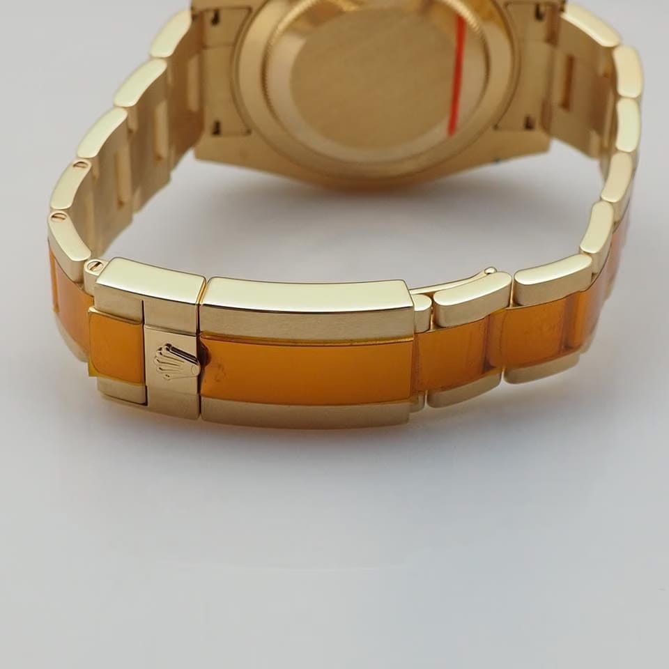 Rolex | GMT-Master II | 116718LN | Yellow gold | 40 mm | Yellow gold | Green | Automatic