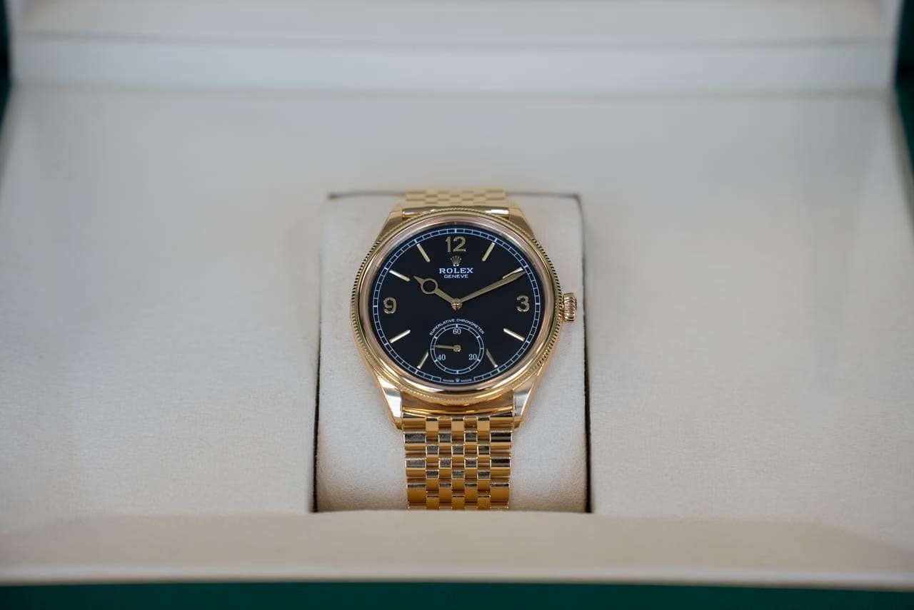 Rolex | 1908 | 52508 | Yellow gold | 39 mm | Yellow gold | Black | Automatic