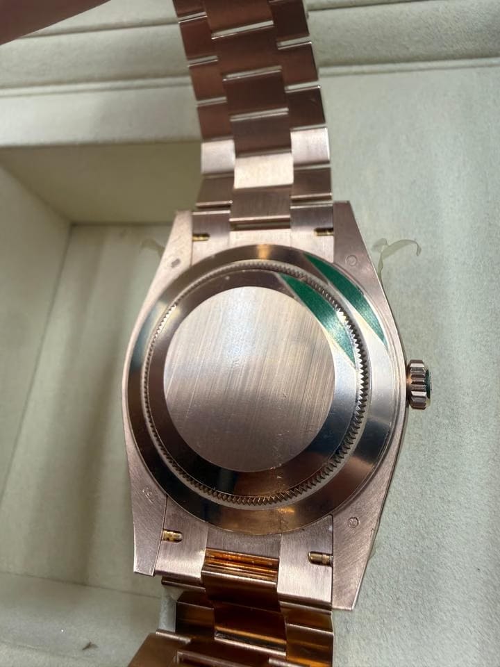 Rolex | Day-Date | 228235 | Rose gold | 40 mm | Rose gold | Brown | Automatic