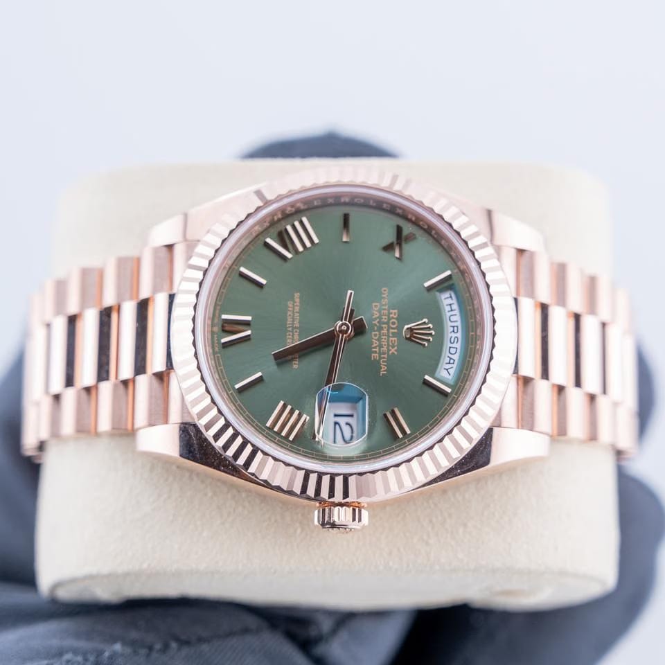 Rolex | Day-Date | 228235 | Red gold | 40 mm | Rose gold | Green | Automatic