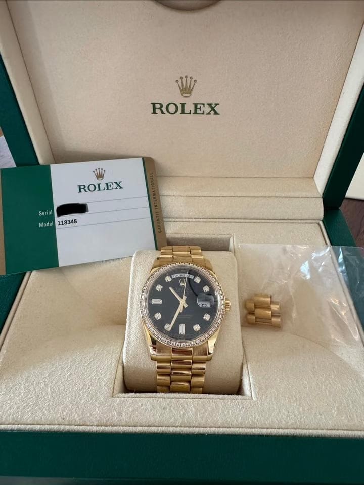 Rolex | Day-Date | 118348 | Yellow gold | 36 mm | Yellow gold | Black | Automatic
