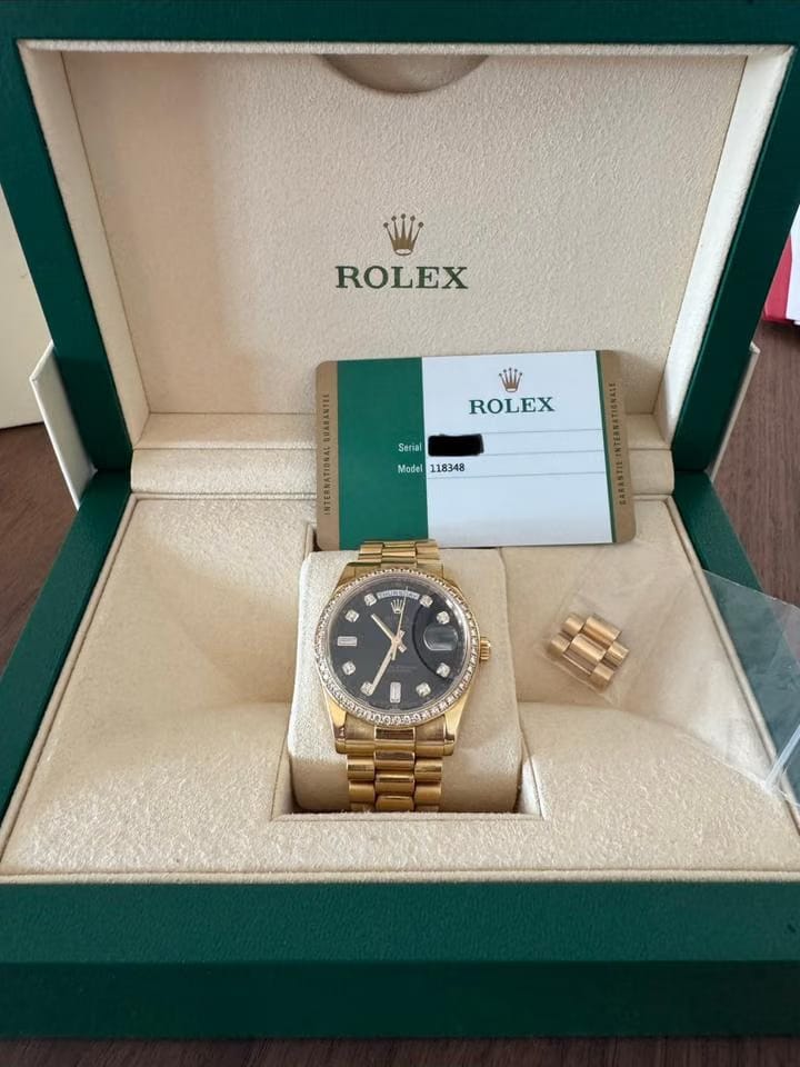 Rolex | Day-Date | 118348 | Yellow gold | 36 mm | Yellow gold | Black | Automatic
