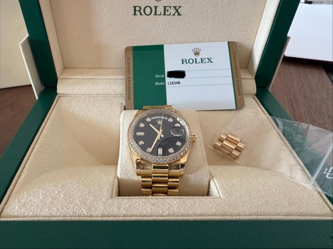 Rolex | Day-Date | 118348 | Yellow gold | 36 mm | Yellow gold | Black | Automatic