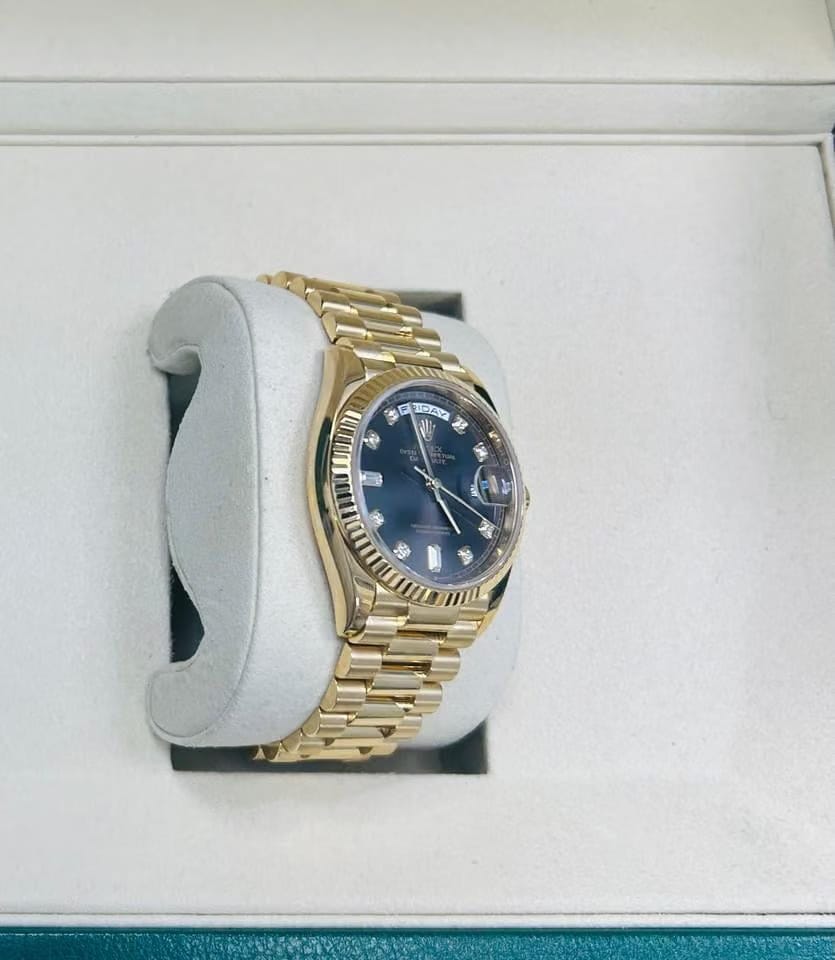 Rolex | Day-Date | 128238 | Yellow gold | 36 x 43 mm | Yellow gold | Grey | Automatic