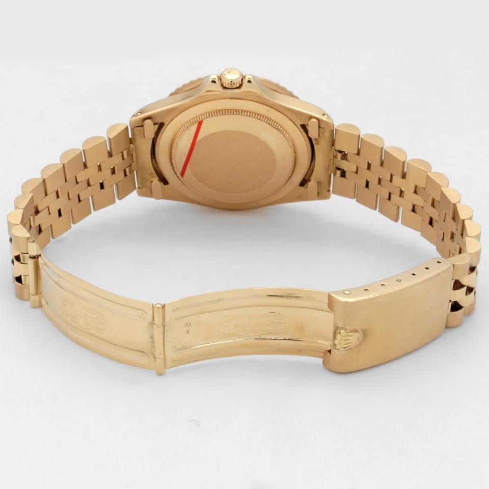 Rolex | GMT-Master | 1675 | Yellow gold | 40 mm | Steel | Brown | Automatic