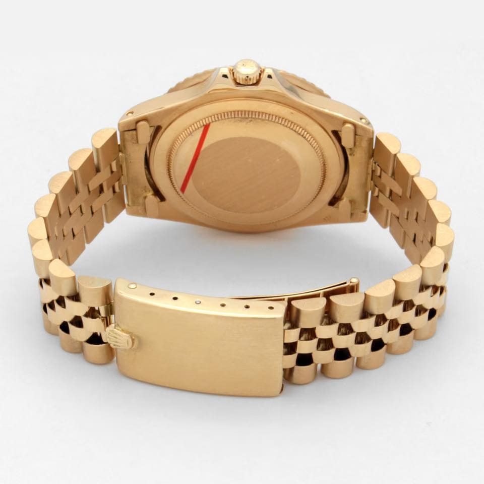 Rolex | GMT-Master | 1675 | Yellow gold | 40 mm | Steel | Brown | Automatic