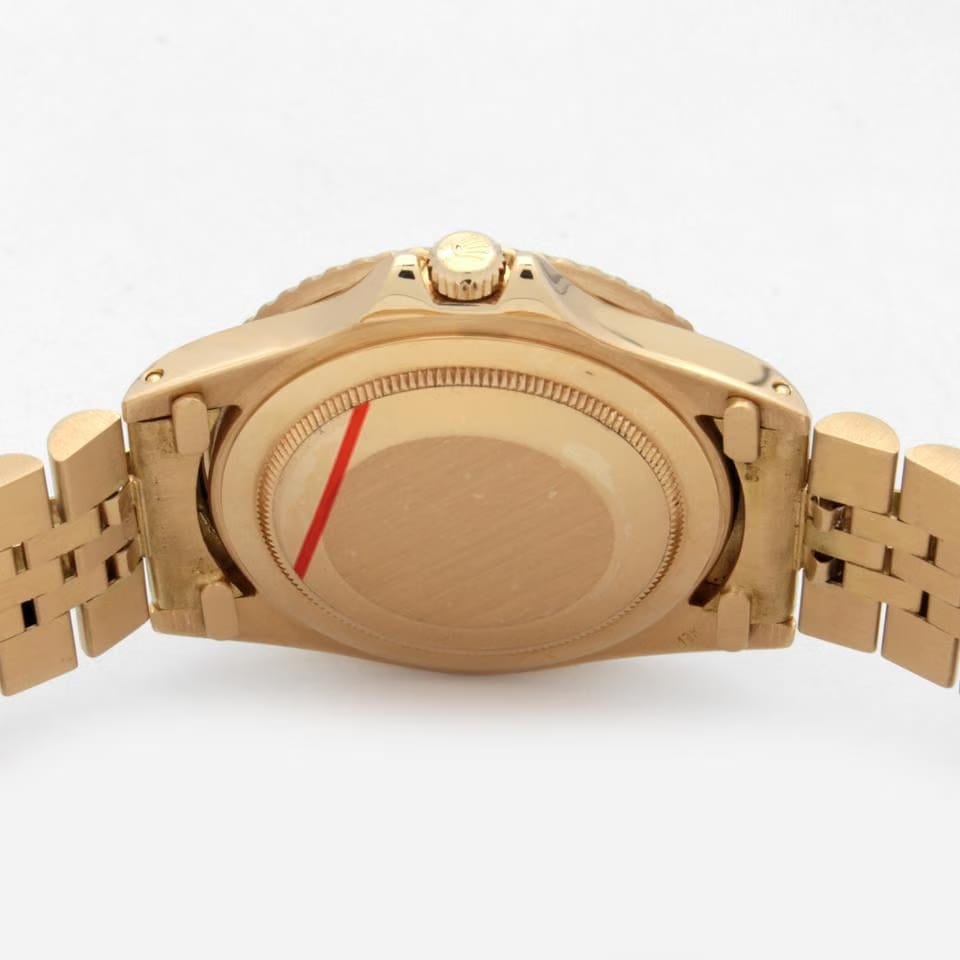 Rolex | GMT-Master | 1675 | Yellow gold | 40 mm | Steel | Brown | Automatic