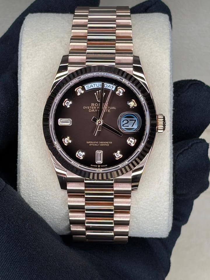 Rolex | Day-Date | 128235 | Rose gold | 36 x 43 mm | Rose gold | Brown | Automatic