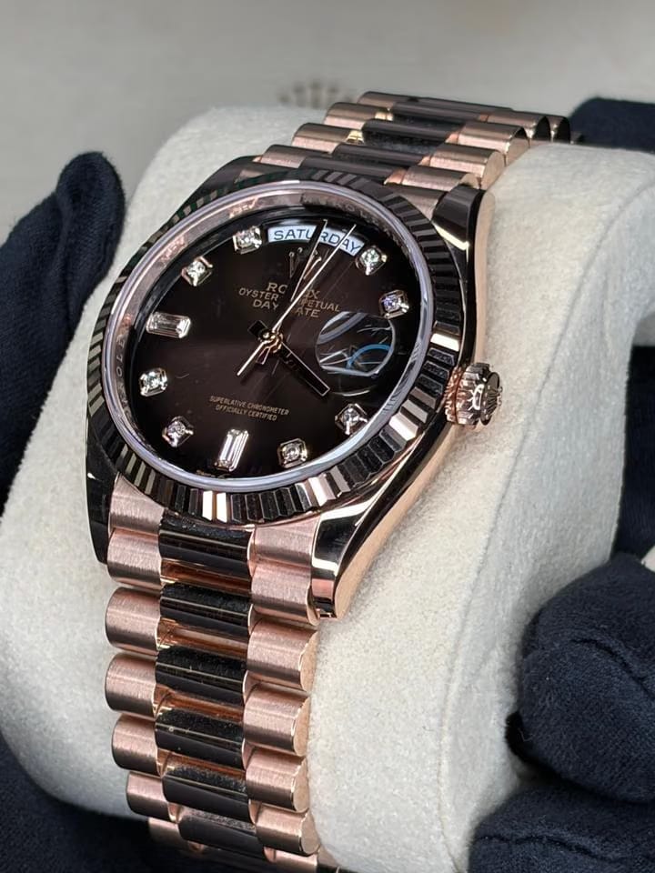 Rolex | Day-Date | 128235 | Rose gold | 36 x 43 mm | Rose gold | Brown | Automatic