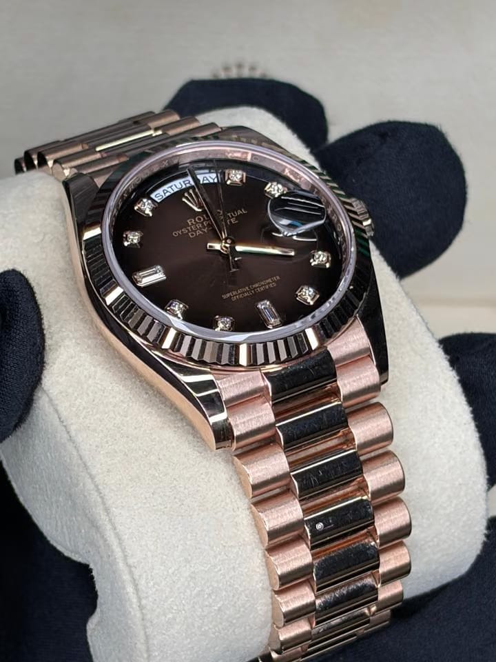 Rolex | Day-Date | 128235 | Rose gold | 36 x 43 mm | Rose gold | Brown | Automatic