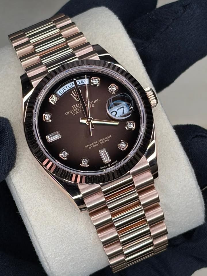 Rolex | Day-Date | 128235 | Rose gold | 36 x 43 mm | Rose gold | Brown | Automatic