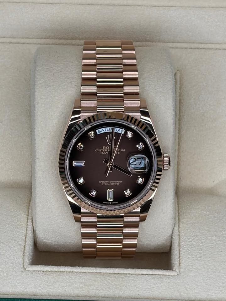 Rolex | Day-Date | 128235 | Rose gold | 36 x 43 mm | Rose gold | Brown | Automatic