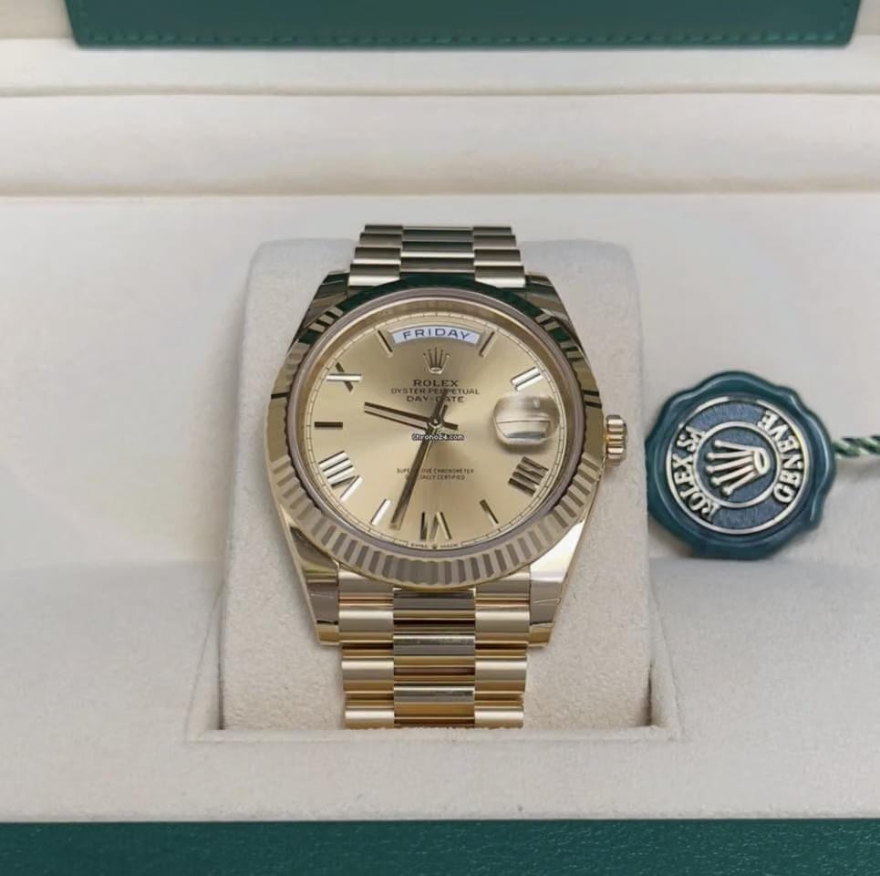 Rolex | Day-Date | 228238 | Yellow gold | 40 mm | Yellow gold | Champagne | Automatic