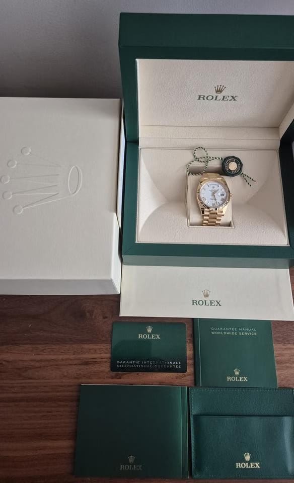 Rolex | Day-Date | 228238 | Yellow gold | 40 mm | Yellow gold | White | Automatic