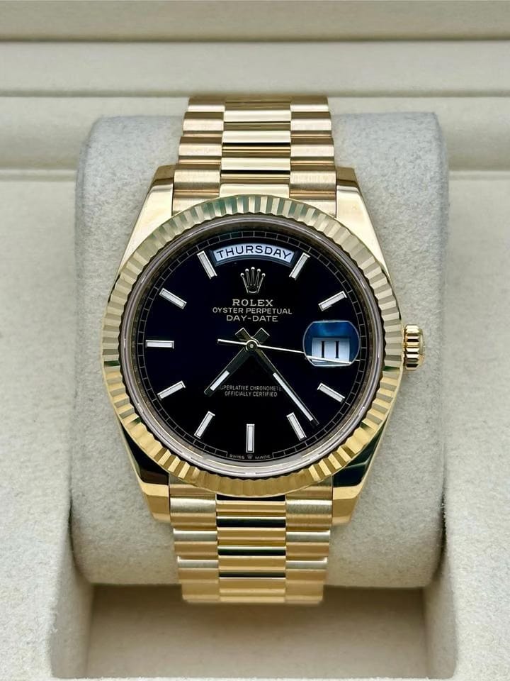 Rolex | Day-Date | 228238 | Yellow gold | 40 mm | Yellow gold | Black | Automatic