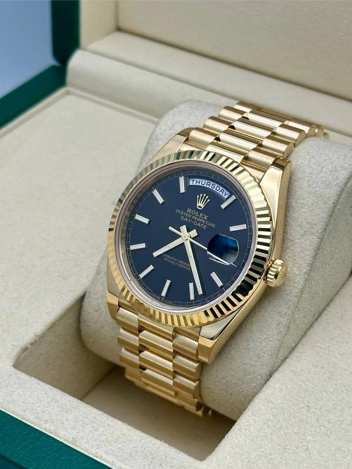Rolex | Day-Date | 228238 | Yellow gold | 40 mm | Yellow gold | Black | Automatic